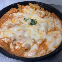 Baked Ziti · Served with ricotta and mozzarella cheese. Served with salad and garlic knots.