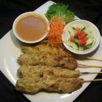 1. Chicken Satay · Marinated chicken in a mixture of spices and coconut milk. Served with homemade peanut sauce...