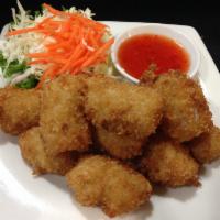 8. Fried Calamari · Calamari deep-fried to a golden brown. Served with our special sweet and sour sauce.