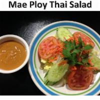14. Mae Ploy Thai Salad · Lettuce, cucumbers, shredded carrots, onions, tomatoes, bean sprouts and cilantro served wit...