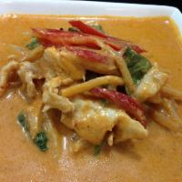 34. Red Curry · Choice of protein cooked with red curry paste, coconut milk, bamboo shoots, bell peppers and...