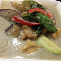 35. Green Curry · Choice of protein cooked with green curry paste, Thai basil, zucchinis, coconut milk, bell p...