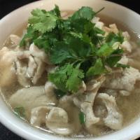 51. Chicken Noodle Soup · Rice noodles with chicken, bean sprouts, green onions, cilantro and fried garlic in a specia...