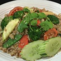 53. Thai Fried Rice · Thai-style fried rice with a choice of protein, tomato, mixed onions, broccoli and egg.
