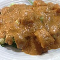 61. Vegetarian Rama · Steamed mixed vegetables and fried tofu topped with peanut sauce. Vegetarian.JASMINE RICE IN...
