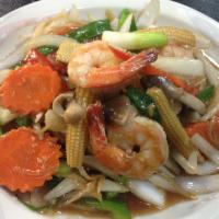 22. Pad Ginger · Choice of protein stir-fried with fresh ginger, mixed onions, baby corns, mushrooms, bell pe...