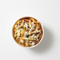 - Greek Fry · Fresh Cut Fries Topped With Hand Crumbled Feta Cheese our House Dressing & Parsley Garnish