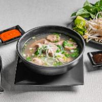 P1. Round Steak Noodle Soup  · Pho tai. Noodle soup with eye of round steak.
