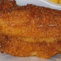 Catfish Combo with a pork chop · A catfish fillet and a pork chop