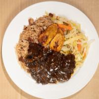 Oxtail · This very tasty tender brown stew oxtail is served over your choice of rice, you can choice ...