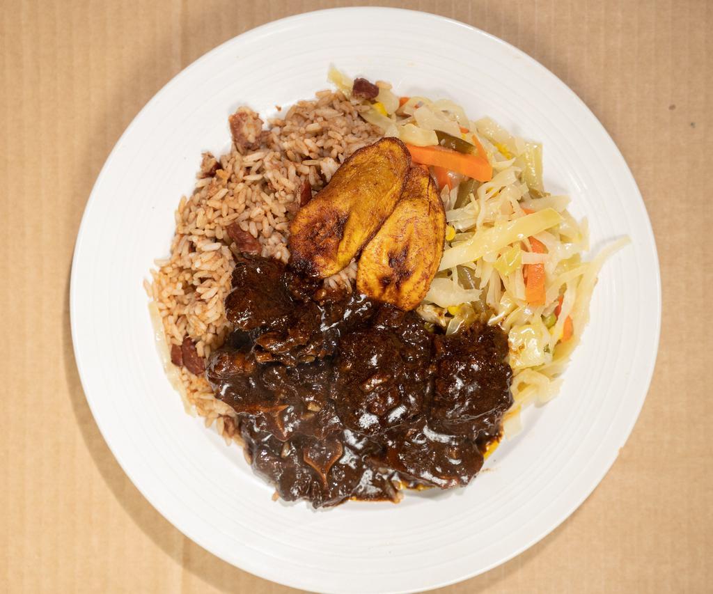 Oxtail · This very tasty tender brown stew oxtail is served over your choice of rice, you can choice your complimentary sides which is steam cabbage and fried plantains, if you don't choice your side it will not be added thank you.