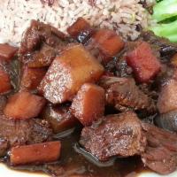 Stew Beef · Brown stew beef server with your choice of rice or your choice of complimentary sides which ...