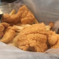 Fired Fish Basket · served with crispy seasoned  French Fries or homemade onion rings