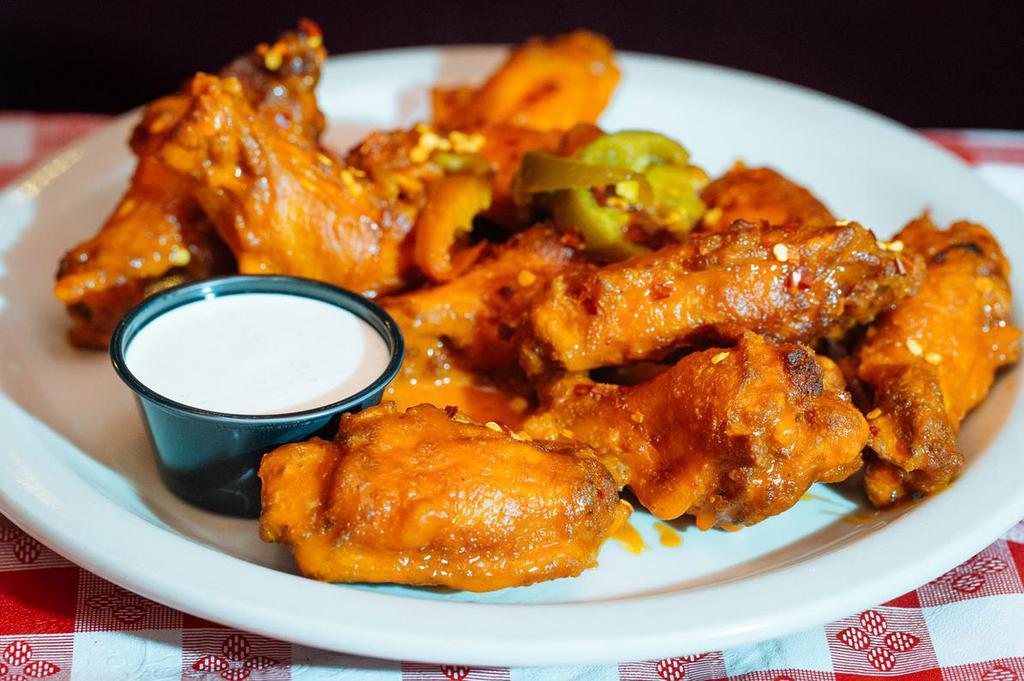 Chicken Wings · Ten crisp jumbo wings, available in 3 styles and levels of spice.