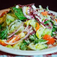 Chopped Salad · Chopped romaine, radicchio, iceberg, red onions, hot peppers, provolone, olives and cherry t...