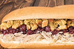 The Hot Bobbie · Coming in hot! The Hot Bobbie takes comfort food to the next level by turning up the heat on the classic Bobbie with grilled slow-roasted turkey, cranberry sauce, handmade stuffing, and mayo. 