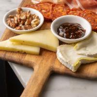 Formaggi · Chef's selection of meats and cheeses. Served with honey and nuts.