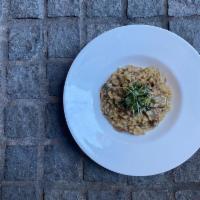 Risotto Con Porcini · Arborio Rice-Porcini Mushrooms, Mascarpone, Parmigiano