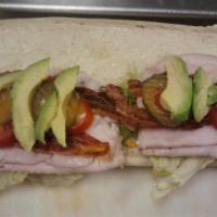 Avocado Turkey Bacon Special · Mayo, mustard, lettuce, tomatoes, pickles and provolone cheese on a toasted sub roll.
