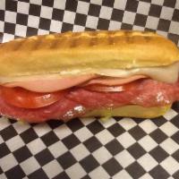 Whole Italian Sub Special · Mayo, mustard, Italian ham, salami and Swiss cheese topped with lettuce, tomatoes, and pickl...
