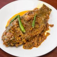 Fish Curry · Chef's choice of Bangladeshi mrigel, katla, ruhu, ayre, boal or koi fish cooked with gravy, ...