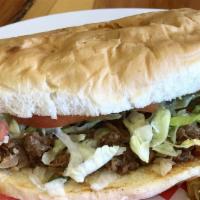 Barbacoa Torta · Served with cilantro, onions and salsa.