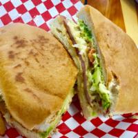 Ham and Cheese Torta · Served with avocado, lettuce, and tomato.