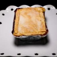 Peach Cobbler Invidual · Baked peached cobbler with a nice golden buttery crust.