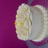 Lemon Burst Mini Cake · Vanilla cake with lemon filling and topped with cream cheese icing.