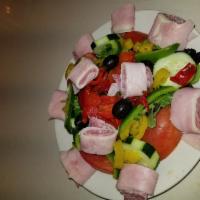 Antipasto Salad · Ham, salami, provolone and fresh mozzarella. Salad, Half Catering Tray, or Full Catering Tray.