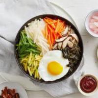 D18. Bibimbob · Rice, beef, egg and assorted vegetable with hot and spicy sauce.