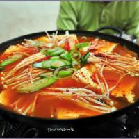 C10. Kimchi Dubu Jeongol · Kimchi and tofu casserole with vegetable.