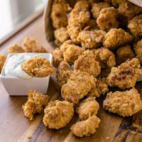 Small Popcorn Chicken · Bite-sized fried chicken. Perfectly seasoned and coated with flour. Delicious. 
