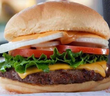 Cheeseburger · 1/3 lb. Angus beef patty, house sauce, lettuce, onions, tomatoes, pickles, and American cheese.