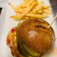 Cheeseburger · Beef burger served with cheese, lettuce, tomatos, onions and pickles. Served with side of fr...