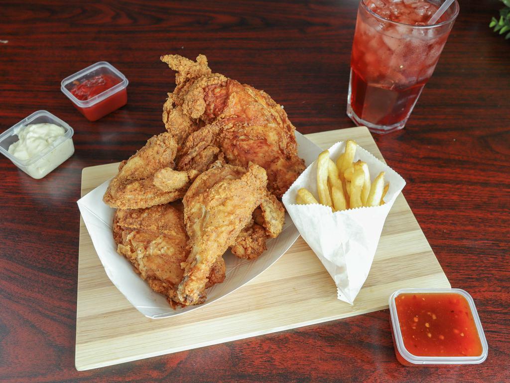 Feast Chicken Meal · Choice of any 4 pieces of leg, thigh, wing, breast. Only 2 breast without up charge. Served with choice of 1 regular side. Choice of roll, biscuit, cornbread. 2 packets ketchup if french fries chosen or upon request for chicken. Comes with 1 jalapeno pepper.
