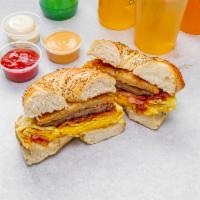 The Hobo Sandwich · Choice of meat with 2 eggs, American cheese, and hash browns on a kaiser roll.