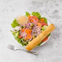 Spring Mix Salad · Carrots, cucumbers, lettuce, green olives, onions and tomatoes.