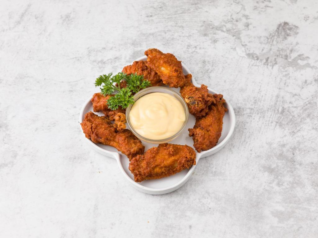 Wing Zings · Breaded and spicy.