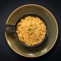 Brown Rice · Hint of rosemary and garlic. (V, GF)