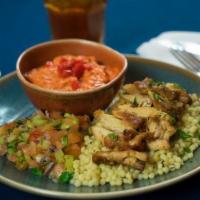 Chicken Shawarma Platter · Slow-roasted and marinated chicken shawarma served over brown rice with a side of summer sal...