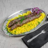 Kefta Kabab Plate · Two 5 oz. skewers of ground lamb and beef. Served with rice, onions, parsley sumac mix along...