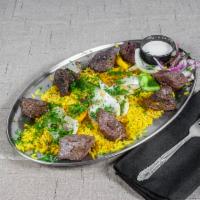 Beef Kabab · Two 4 oz. skewers of tenderloin marinated and grilled with vegetables served with rice, pita...