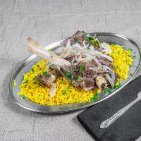 Lamb Shank · Lamb shank marinated and slow roasted in the oven topped with caramelized onions and mushroo...