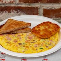Western Omelette  · 3 eggs. Ham, peppers and onions. Includes a hash brown