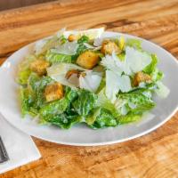 Caesar Salad · Romaine lettuce, croutons, lemon and Parmesan with Caesar dressing.