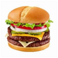 1/2 lb. Cheese Grill Burger · 1 1/2 lb. 100% beef burger topped with melted cheese, thick-cut tomato, pickles, onions, ket...