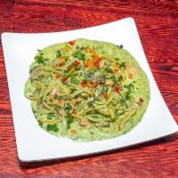 Veggie Pesto Pasta · Linguine pasta served with medley vegetables and pesto sauce.