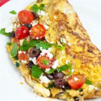 Greek Omelette · Black olives, peppers, onions and feta cheese.