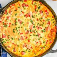 Western Omelette · Ham, Onions, peppers, tomato.